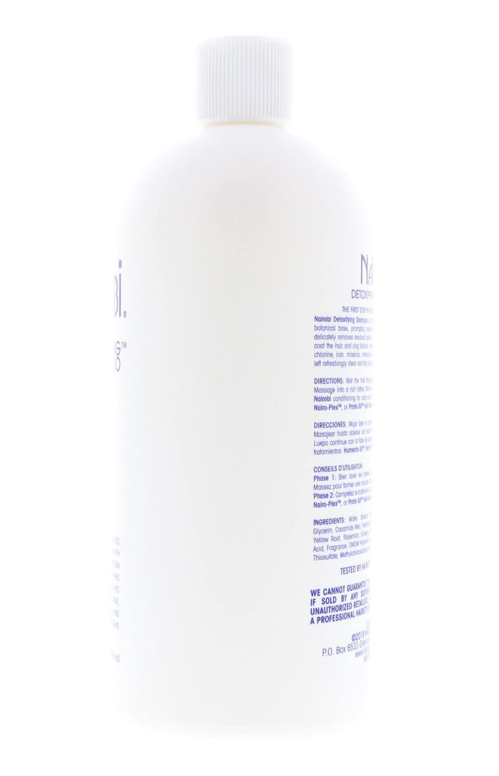 Nairobi Detoxifying Shampoo pump closeup communicates easy dispensing and mess-free use.