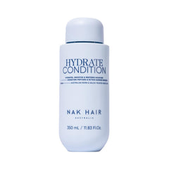 NAK Signature Hydrate Condition bottle front offering deep moisture for dry hair