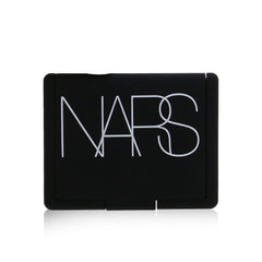 NARS Blush Dominate brush application demonstrates seamless color lift.