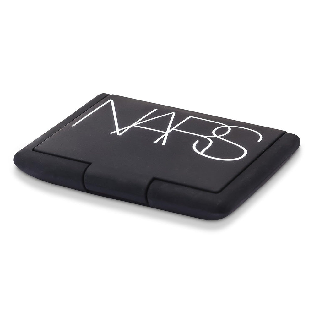NARS Exhibit A vegan pigments provide rich color with pearlescent blur.