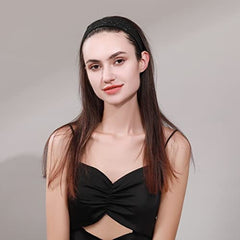 Natalie Mills black headband worn with yoga wear for versatile style.