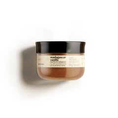 NATIVA SPA Madagascar Vanilla Scrub bottle shown, delivers hydrating, gentle exfoliation for smooth skin.