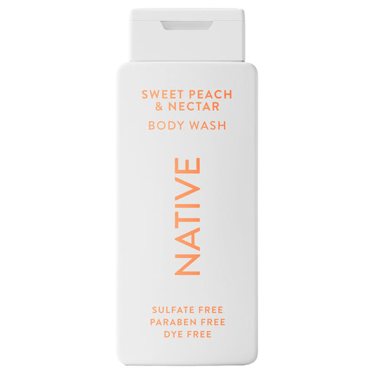Native Body Wash Sweet Peach Nectar bottle in a clean bathroom for a refreshing daily cleanse.