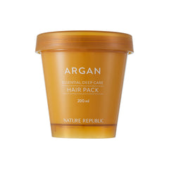 Nature Republic Argan Essential Deep Care Hair Pack bottle closeup showing nourishing formula.