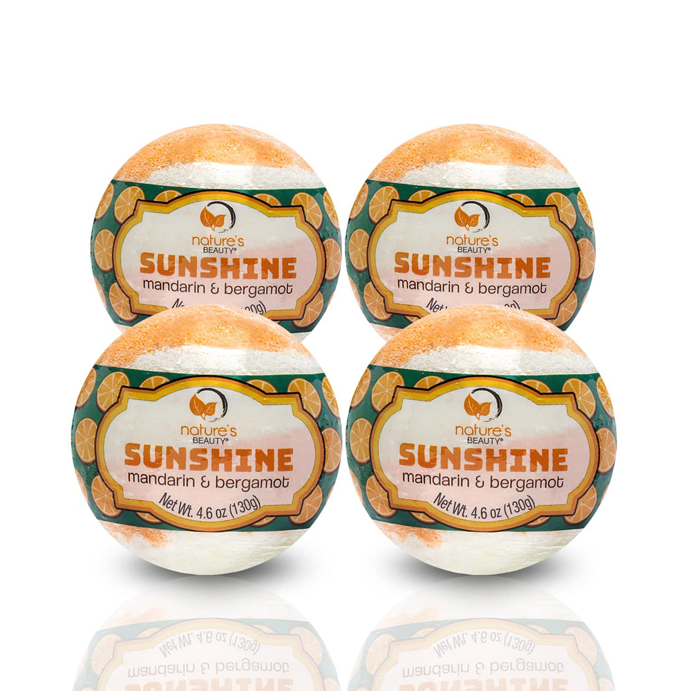 Nature's Beauty Sunshine Mandarin and Bergamot bath bombs fizzing in a tub with uplifting aroma