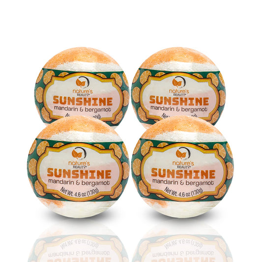 Nature's Beauty Sunshine Mandarin and Bergamot bath bombs fizzing in a tub with uplifting aroma