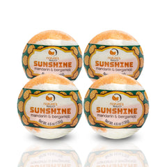 Nature's Beauty Sunshine Mandarin and Bergamot bath bombs fizzing in a tub with uplifting aroma