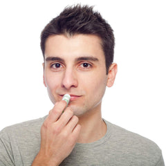 Naturistick lip balm application glide for silky, non-sticky wear.