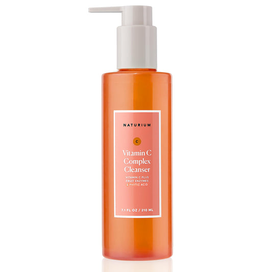 Naturium Vitamin C Complex Cleanser bottle closeup showing gentle exfoliation for radiant skin