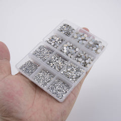 NCB 8000pcs nail art tools with tweezers for easy placement precision.