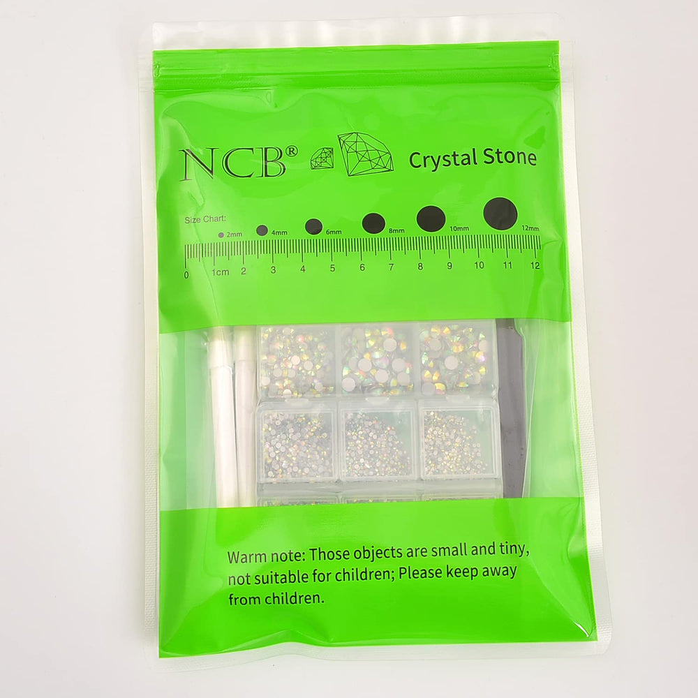 DIY crafting session with crystal glass rhinestones and tools