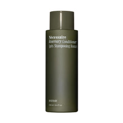 Nécessaire Rosemary Conditioner bottle on bathroom shelf for daily strengthening