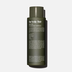 Nécessaire Rosemary Conditioner pump dispenser shown for easy application