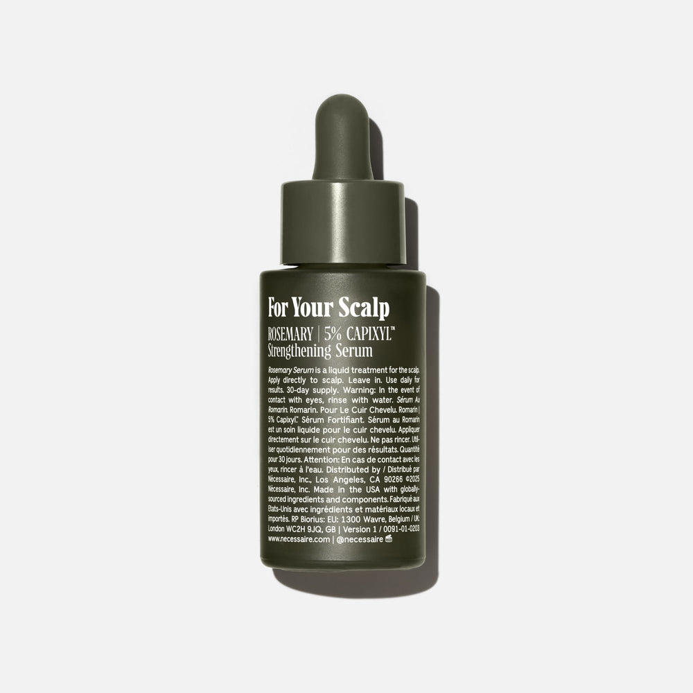 Nécessaire Rosemary Serum dropper applying to scalp for quick-dry hydration