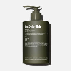 Rosemary shampoo closeup label highlighting plant-based cleansing and color-safe formula.
