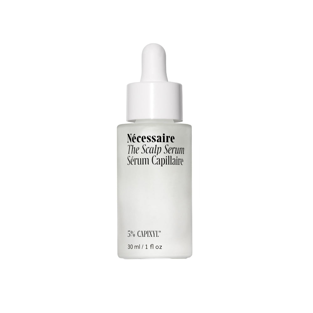 Nécessaire Scalp Serum bottle close-up, fragrance-free formula for sensitive scalps.