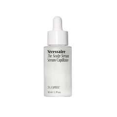Nécessaire Scalp Serum bottle close-up, fragrance-free formula for sensitive scalps.