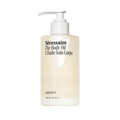 Nécessaire The Body Oil bottle pour demonstrates smooth, fast absorption for daily skincare.