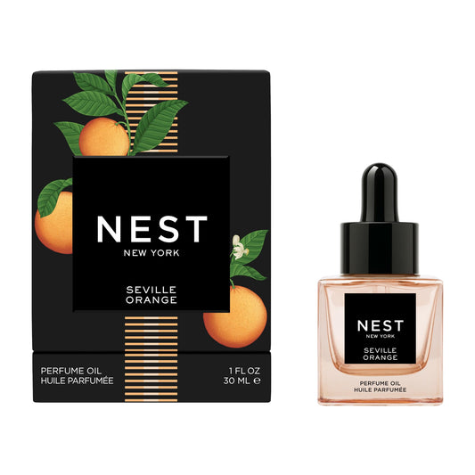 NEST New York Seville Orange perfume oil bottle pour showcasing the luxe fragrance vessel.