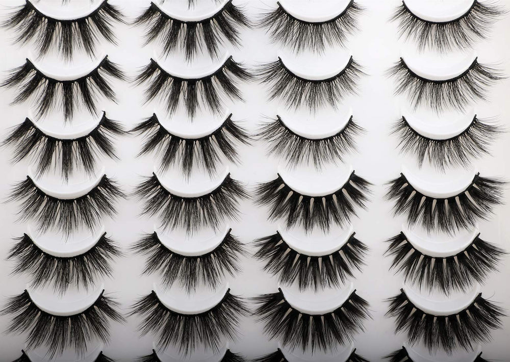 Newcally easy-apply lashes demonstrated with tweezers for quick application.