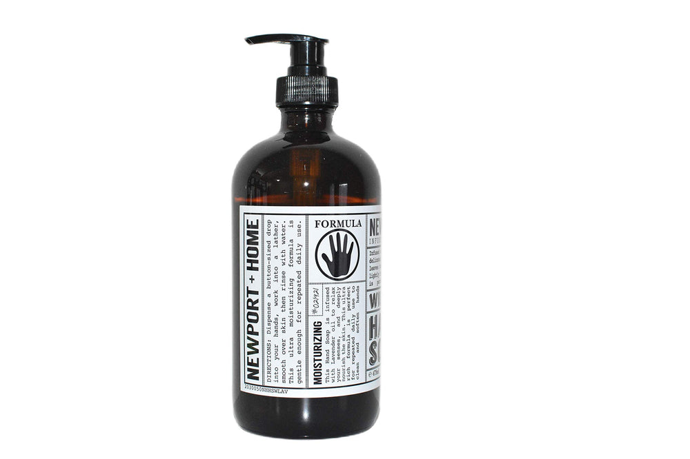 Two glass bottles showcase wild lavender hand soap for stylish bathroom decor.