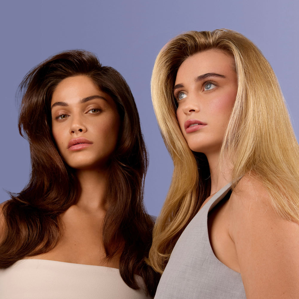 Foamy lather on hair demonstrates the light, weightless cleansing of Nexxus Hy-Volume.