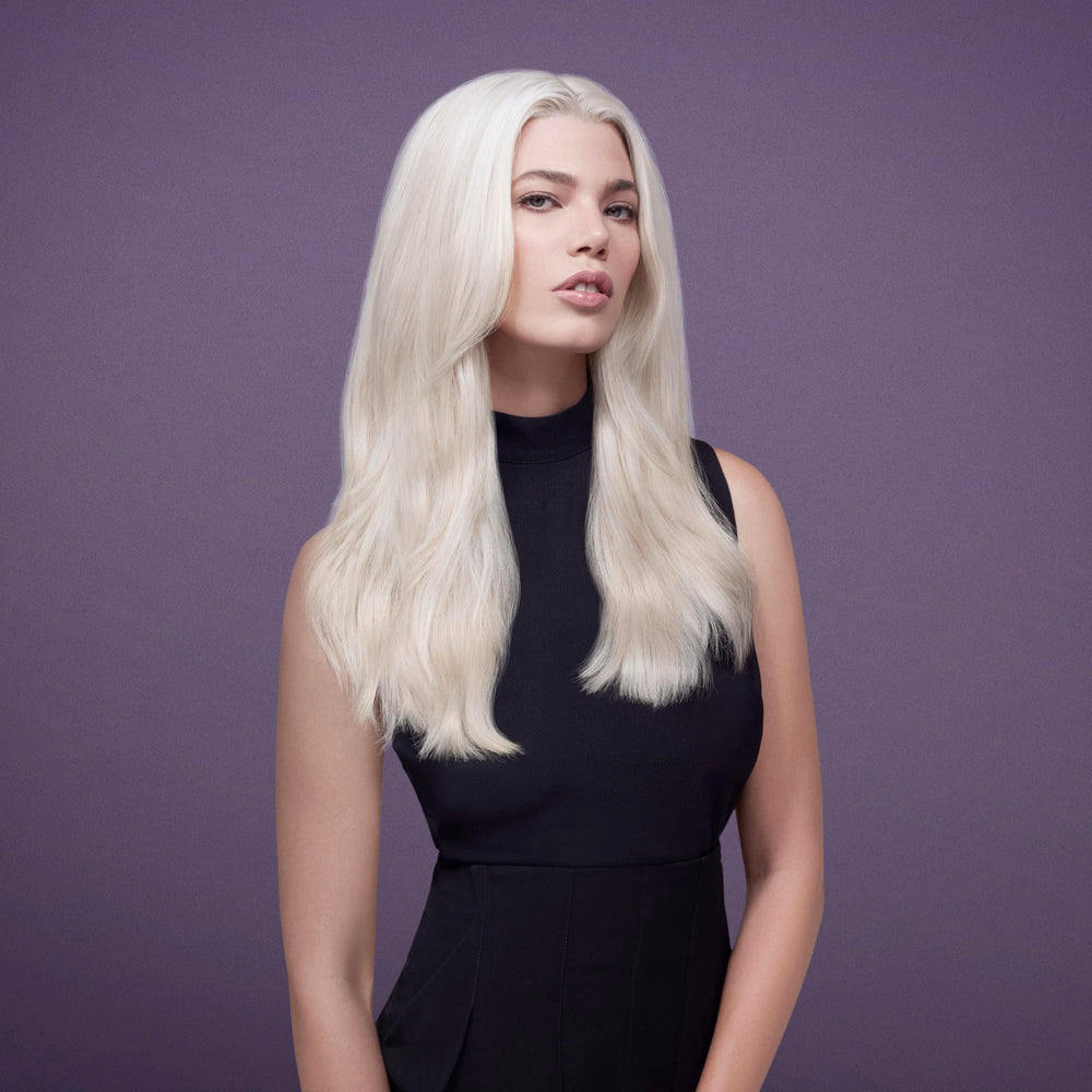 Nexxus Keraphix leave-in option applied on damp hair for conditioning