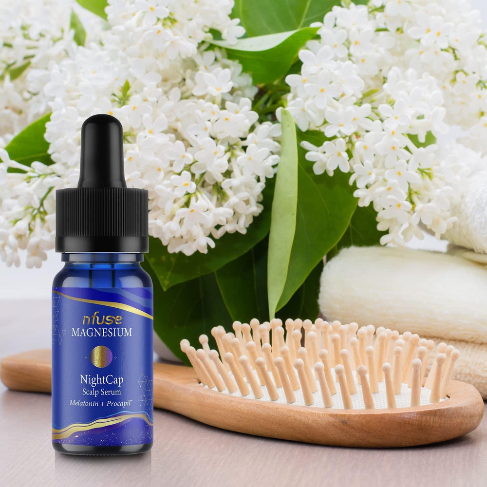 nfuse NightCap serum applying to scalp for quick absorption