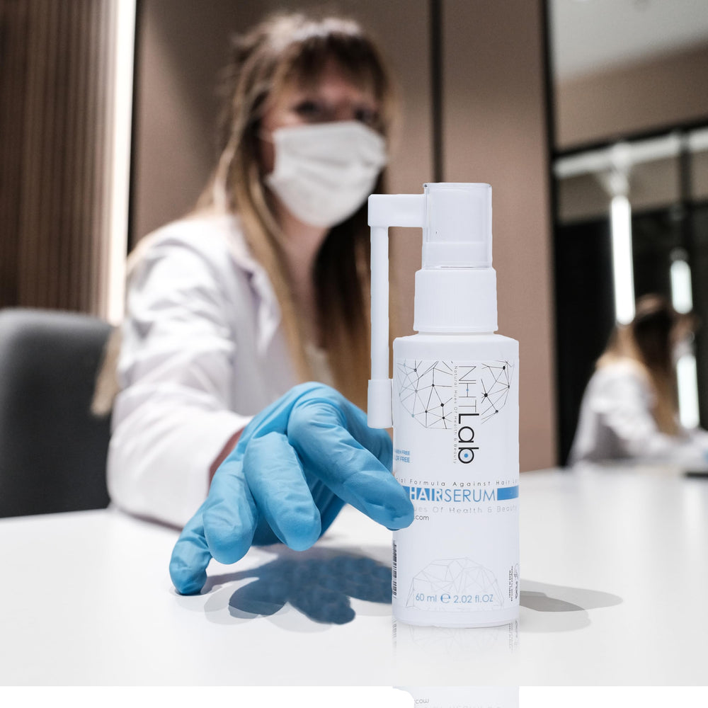 NHTLab Hair Growth Serum applied to the scalp for targeted nourishment