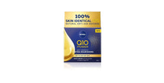 NIVEA Q10 Power Night Cream application demonstrates rich texture for overnight renewal.
