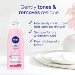 Close-up of almond oil enriched formula moisturizing dry skin