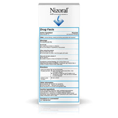 Fresh-scent Nizoral A-D foam lather on wet hair during routine wash
