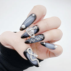 NLSJMP rhinestone and pearl nail art design adds subtle sparkle.