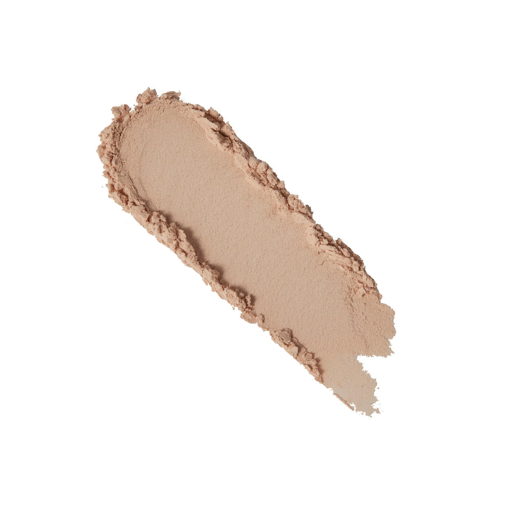 No7 Flawless Finish loose powder brush-application helps blend for a soft matte look.