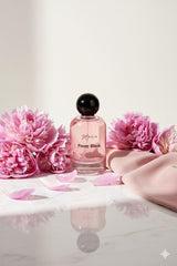 NOIR Peony Blush packaging in hand, travel friendly and convenient