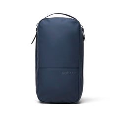 NOMATIC Toiletry Bag in Navy shows travel-ready organization and water-resistant construction.