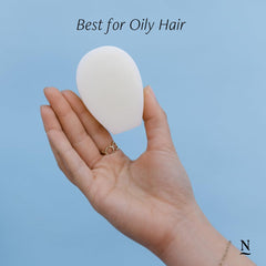 Nopalera Balance conditioner bar on wet hair ready for easy glide.