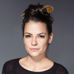 Noverlife elegant updo with two-prong pins demonstrates versatility.