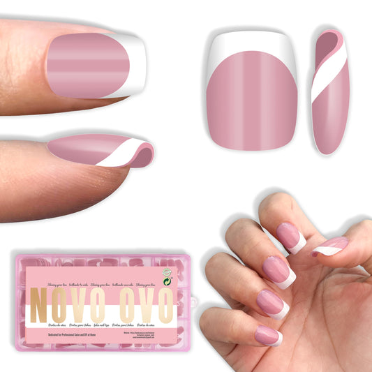 NOVO OVO berry-pink short square round nails on hand for at-home salon-quality manicure.
