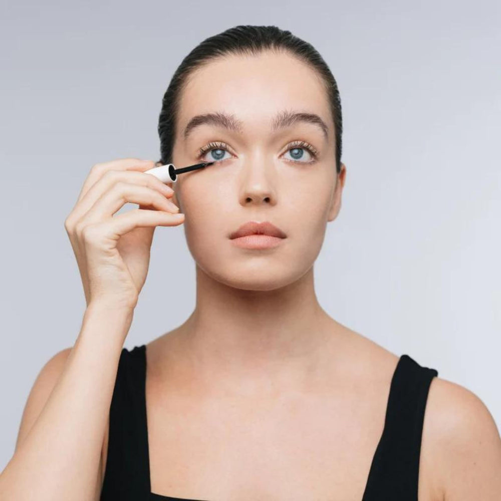 Nu Skin Nu Colour Lash + Brow Serum closeup texture reveals lightweight formula.