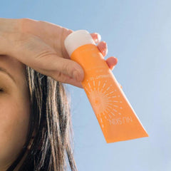 Texture close-up of Nu Skin Sunright SPF 50 with non-greasy feel