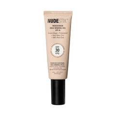 Nudestix Nudescreen warm tint swatch on arm showing natural glow.