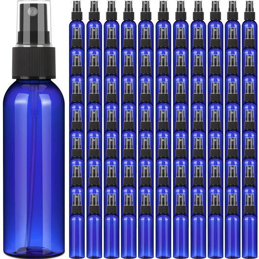 Nuogo blue 4 oz spray bottle set, ideal for travel and refilling.