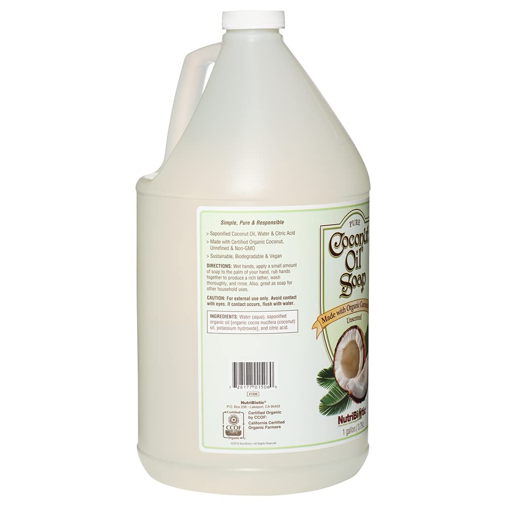NutriBiotic coconut oil soap being lathered on hands for gentle cleansing.