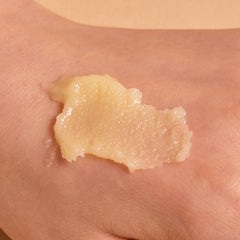 Nutseline Super Nut Balm close-up with vitamin E and shea butter for hydration.