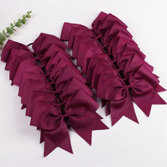 OAOLEER back closure bow demonstrates integrated ponytail holder