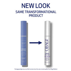 Close-up of the Nu-Cil applicator brush applying serum for precise lash care.