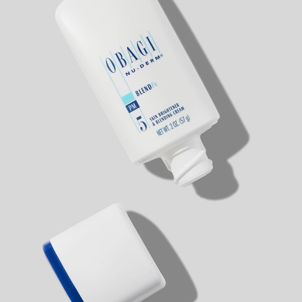 Obagi Nu-Derm Blend Fx jar being spread on skin for even tone
