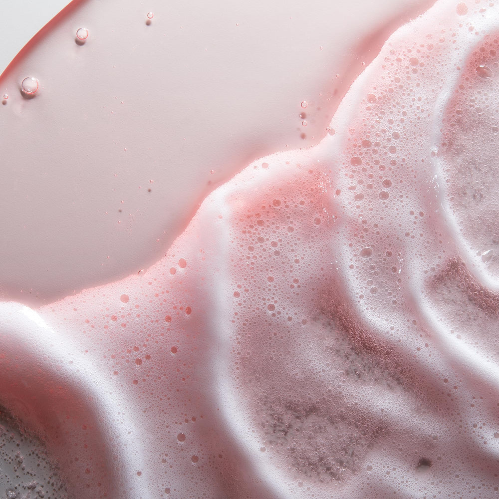 Makeup removal action with Obagi Nu-Derm Foaming Gel.