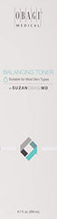 Obagi SUZANOBAGIMD Balancing Toner on cotton pad for gentle pore cleansing